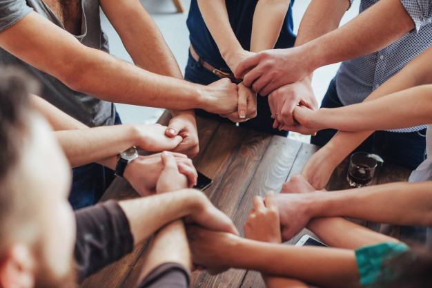 group-diverse-hands-together-joining-teamwork-friendship_146671-813